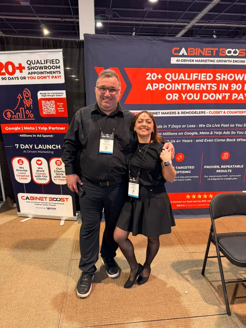 Sezgin Arslan and team member at CabinetBoost Booth SL3205, KBIS 2025 Las Vegas — both booth banners fully visible, day two